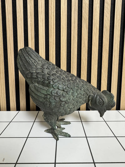 Bronzen kippen beeld