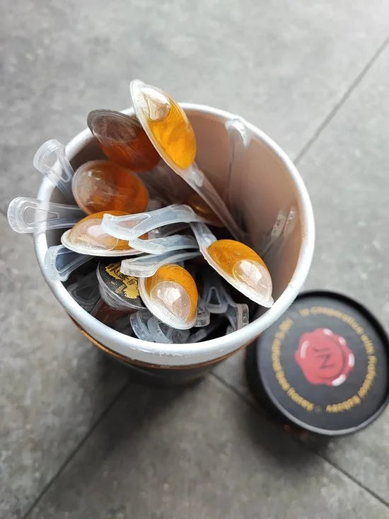 55 X HONEY SPOONS IN LUXE GIFT CYLINDER